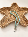 Ocean Necklace on a cream display bust with New Jersey pendant