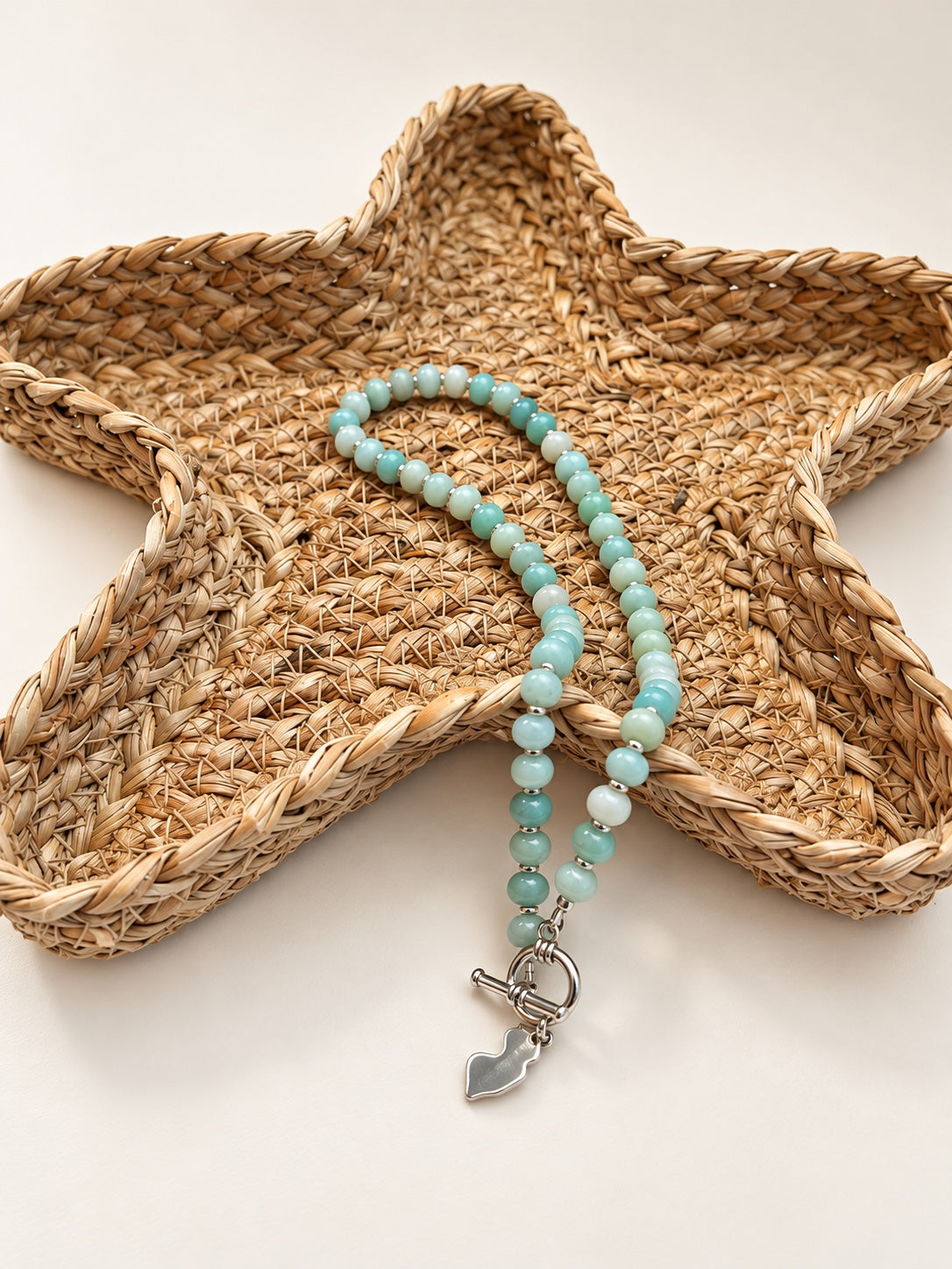 Ocean Necklace on a cream display bust with New Jersey pendant