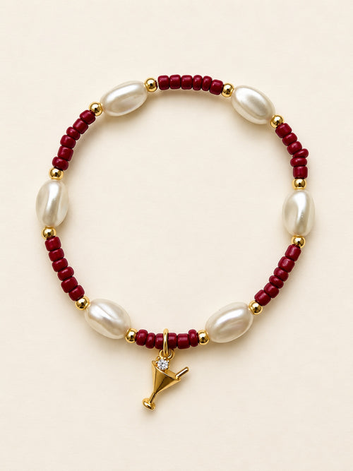 Burgundy and pearl bracelet with gold martini charm