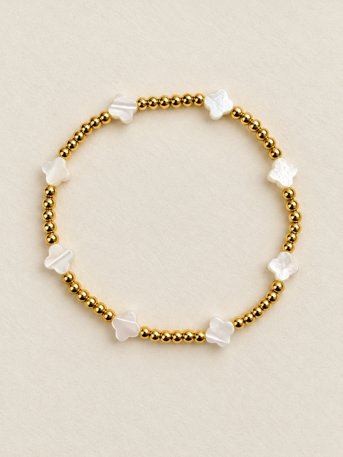Gold-tone and white clover bead bracelet