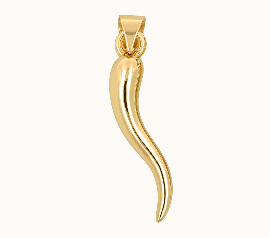 Single curved gold-tone horn charm on off-white