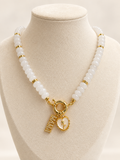 Ivory & Gold Beaded Necklace styled with charms; charms sold separately