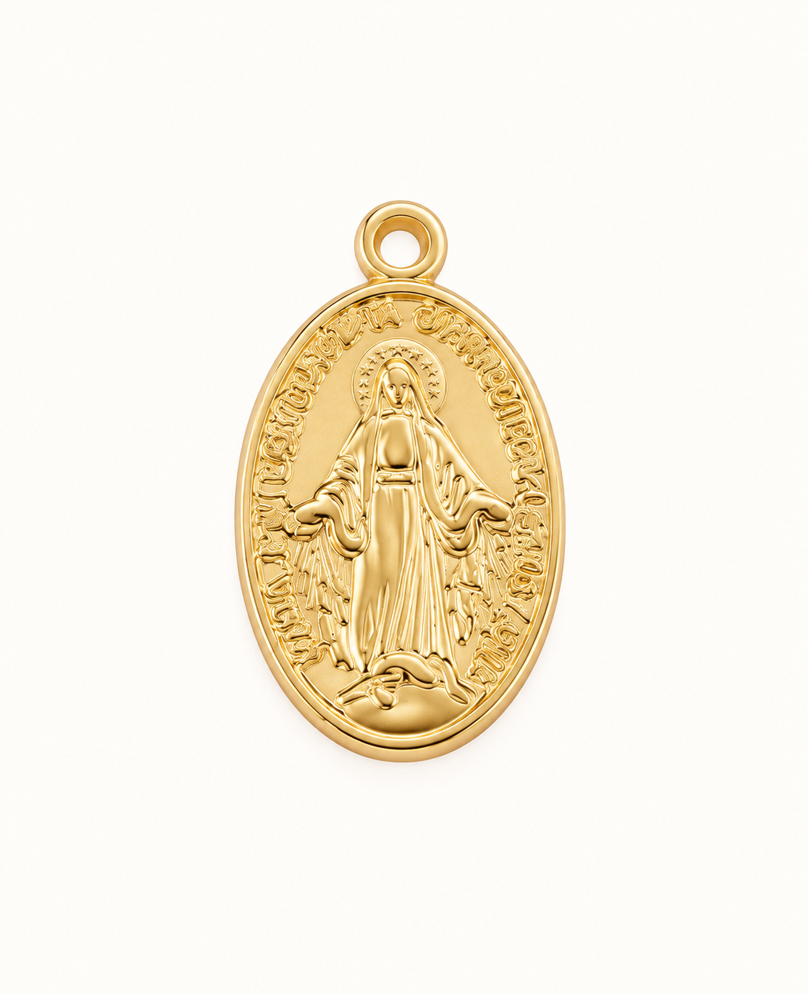Single gold-tone oval Mary medal charm on off-white