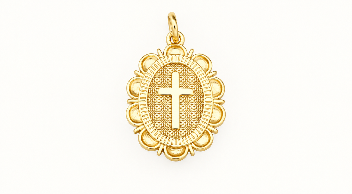 Single ornate gold-tone cross charm on off-white