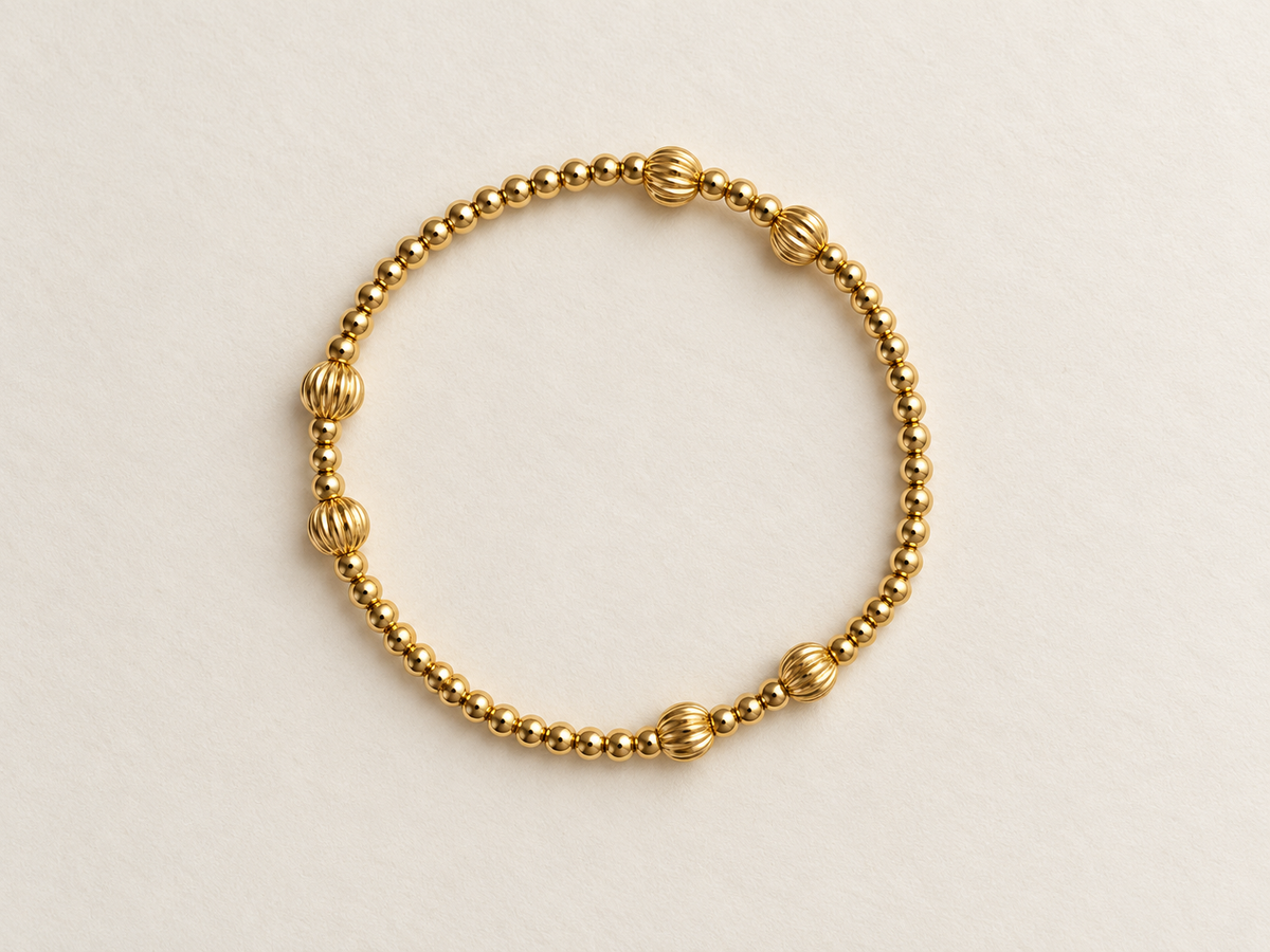 Gold bracelet with smaller pumpkin accent beads